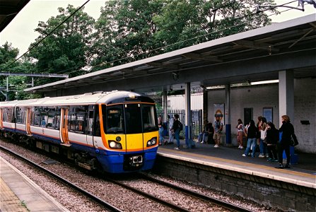 London Underground train 378 206 in new livery enters Highbury & Islington station platform 8, bound for Stratford. photo