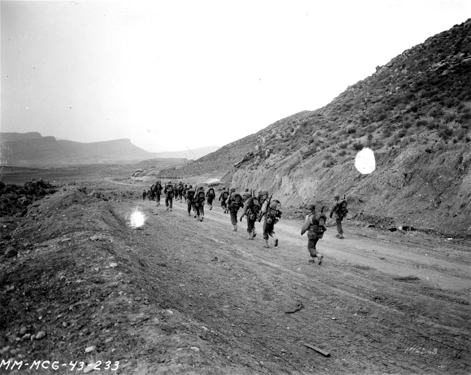 SC 170123 - 2nd Bn. 16th Infantry march through the Kasserine Pass, on to Kasserine and Farriana, Tunisia.