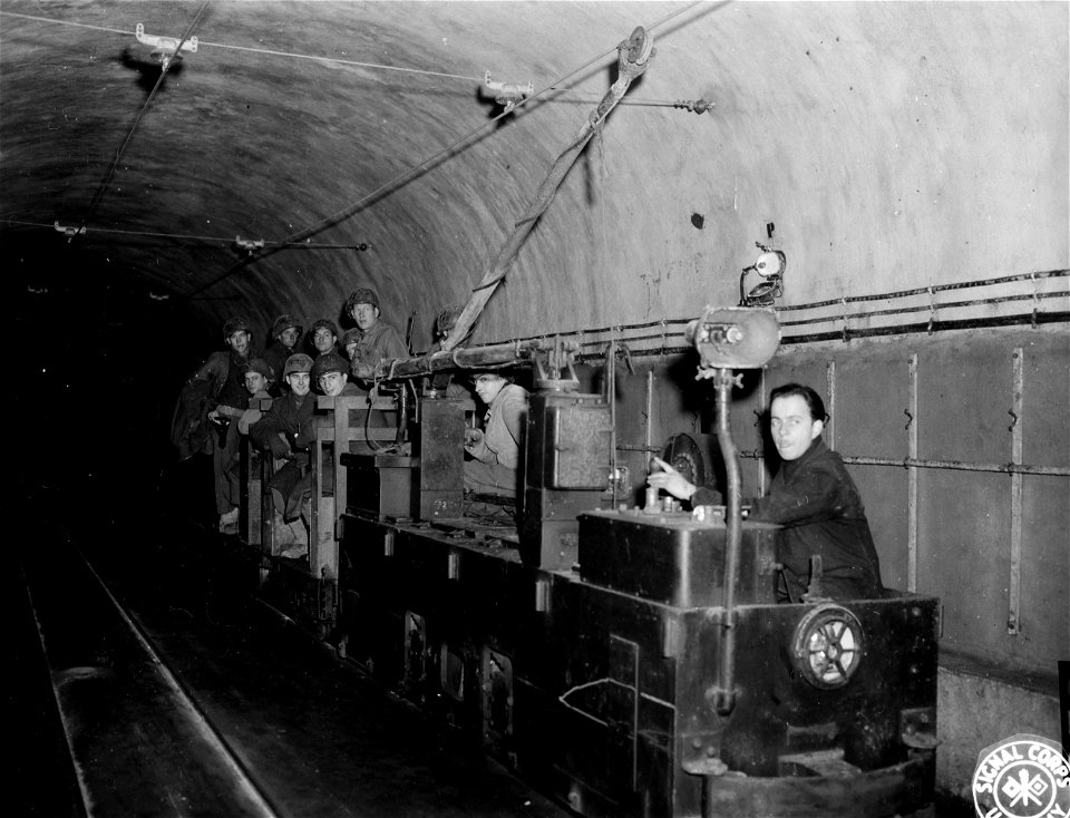 SC 196144 - Members of an infantry unit ride a train running through the Maginot Line defenses near Errouville, France. 31 October, 1944. photo