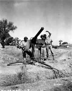 SC 329821 - The .50 cal. machine gun and crew of the 90th Coastal Artillery are temporarily stationed at Oujda, North Africa, near U.S. Fifth Army headquarters upon the request of the Sultan of Morocco for his protection during his visit there. photo