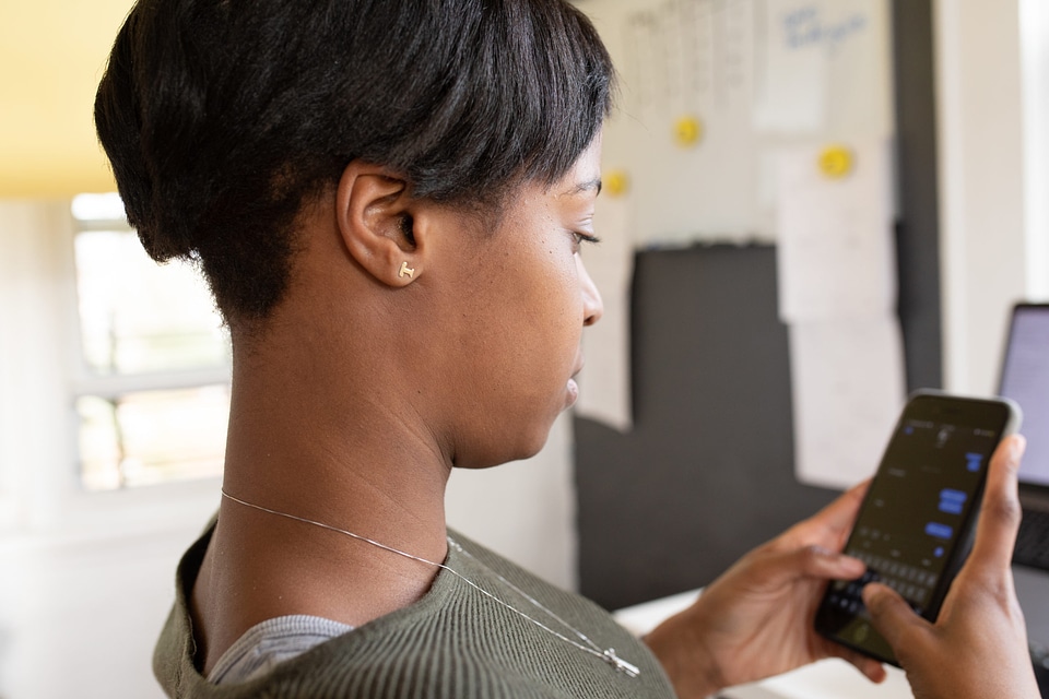 Woman texting woman