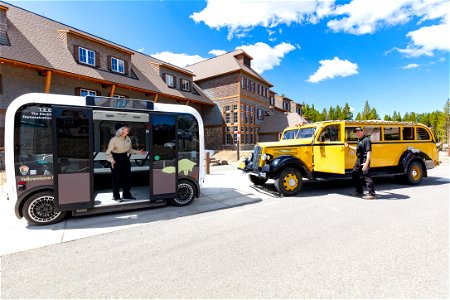 Transportation in Yellowstone, old and new: Checking out each other's ride photo