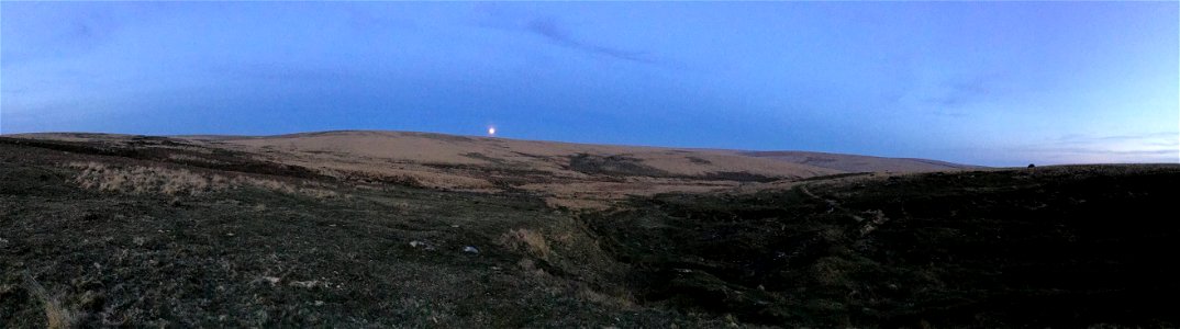Moonrise,  Sunset, Evil Combe, Dartmoor National Park, Devon, UK. 16th April 2022 (Apple Ipod Panoramic Photo)