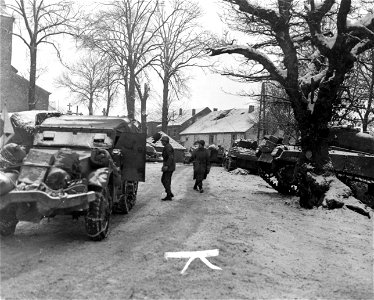 SC 329976 - American armor is concentrating in Cherain, Belgium, before pushing on to meet advancing columns of 3rd U.S. Army. photo