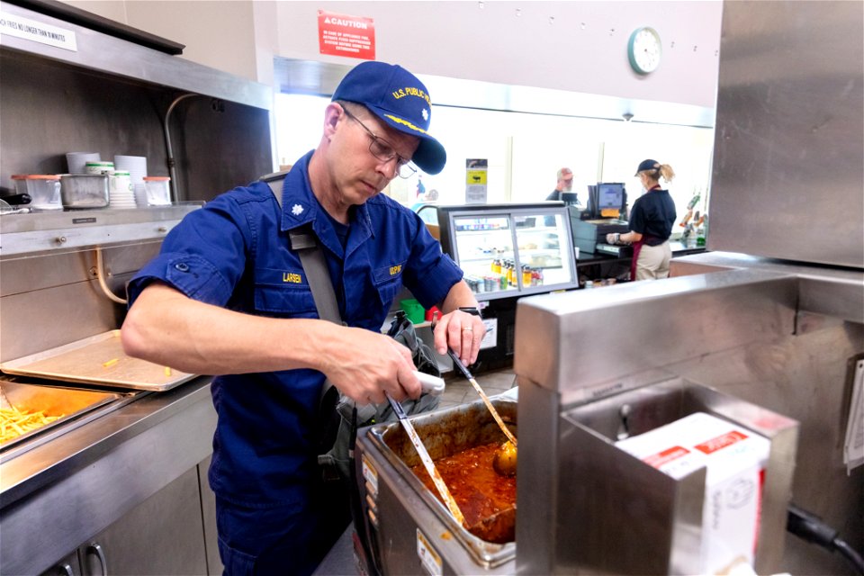 Commander George Larsen, Public Health Consultant, inspecting food services (5)