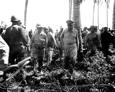 SC 196084-S - General Douglas MacArthur inspects a beachhead at Leyte Island in the Philippines. 20 October, 1944. photo