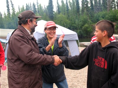 YKSD Native Language Coordinator Susan Paskvan teaching language lessons to students and Refuge Manager Mike Spindler
