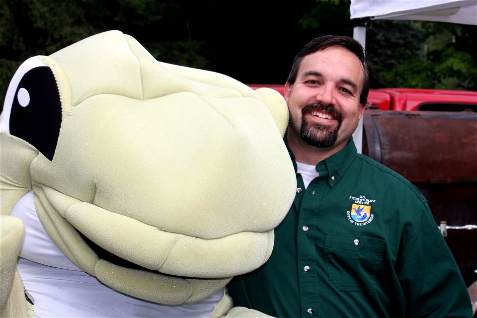 Aaron Woldt, FWCO Supervisor, and Lucy the Lake Trout