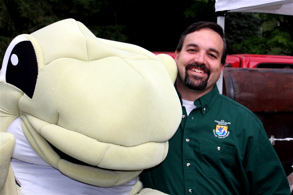 Aaron Woldt, FWCO Supervisor, and Lucy the Lake Trout photo