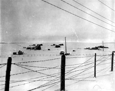 SC 199015 - U.S. Third Army armored vehicles park on a snowy slope near Morhet, Belgium. 9 January, 1945.