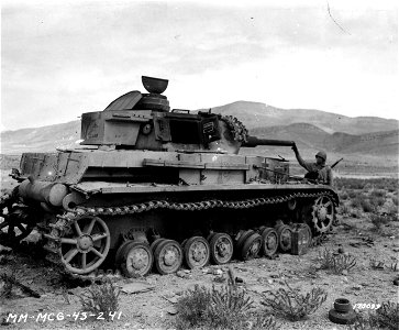 SC 170099 - A German Mark IV tank knocked out by American artillery fire. photo