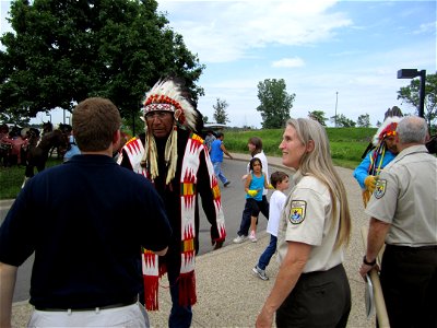 Deputy Refuge Manager Jeanne Holler and U.S. Fish and Wildlife Service Native American Liaison Tim Patronski meet Chief Arvol Looking Horse upon arrival at Minnesota Valley National Wildlife Refuge photo