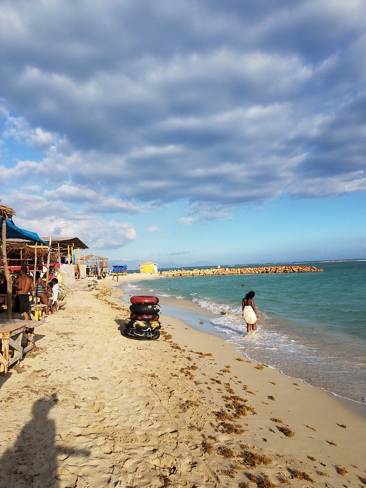 Beach and Shacks by the ocean under the skies in Kingston, Jamaica