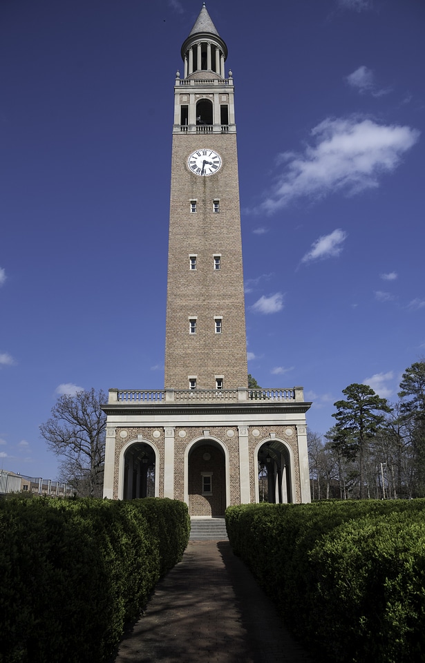 Clock Tower among hedges in University of North Carolina, Chapel Hill