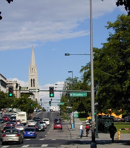Colfax Avenue with traffic during the day in Denver, Colorado