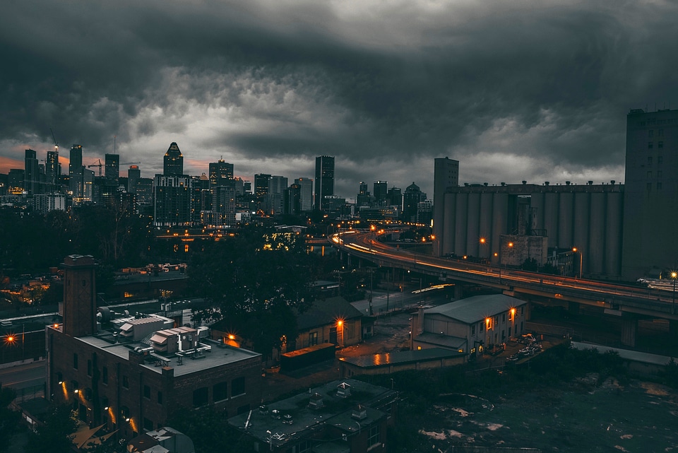 Black Clouds over the Night Time Cityscape of Montreal, Quebec, Canada