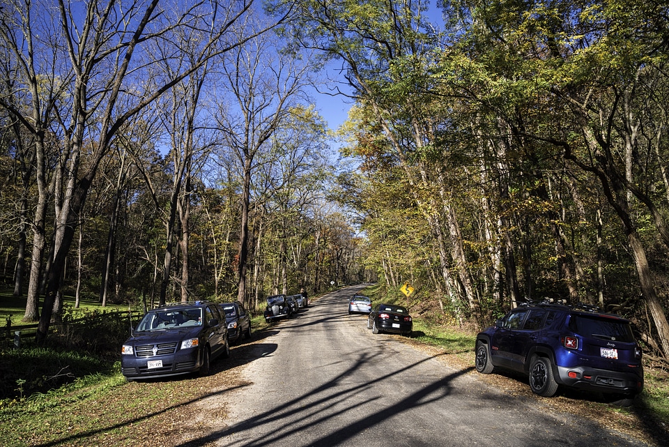 Autumn Trees with Cars on the Road in Morton County Forest, Wisconsin