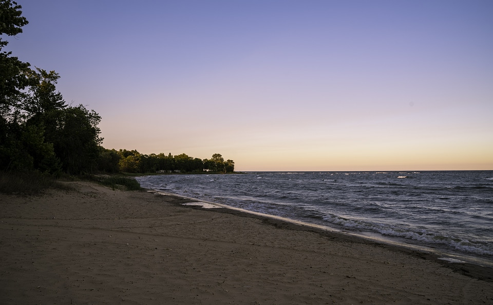 Shoreline of lake Michigan at Dusk at J.W. Wells State Park, Michigan photo