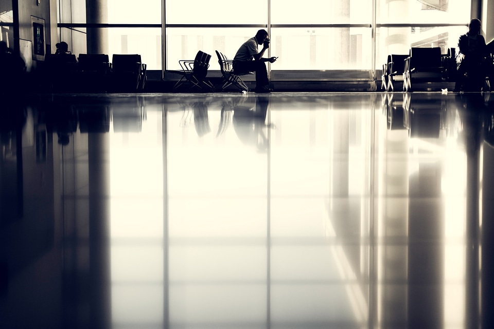 A guy waiting at the airport photo