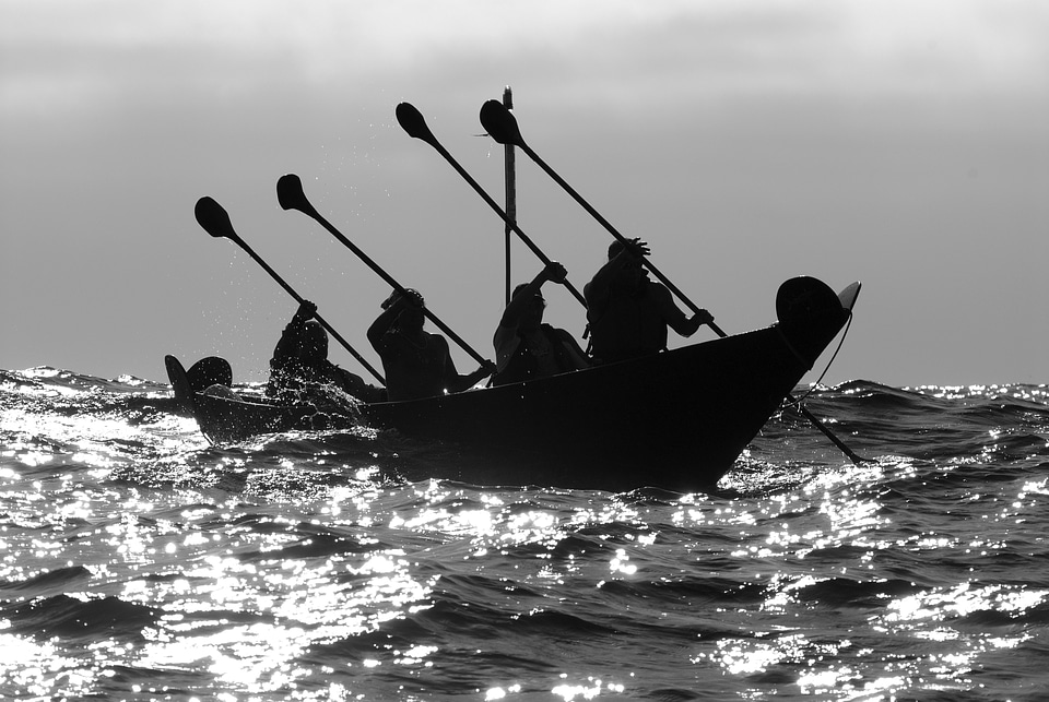 People rowing a canoe in Channel Islands National Park, California