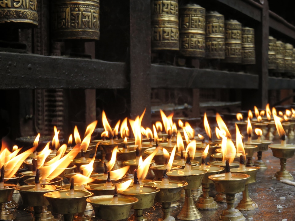 Candlelight offerings in the temple in Kathmandu, Nepal