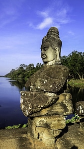 Buddha statue on rock in Sri Lanka photo