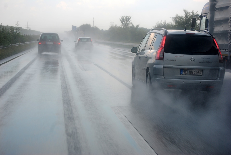 Cars Driving on a rainy day