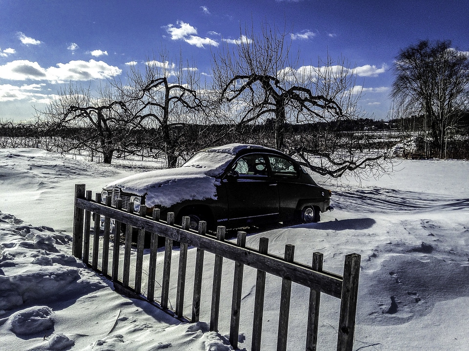 Car in the snow in New Hampshire