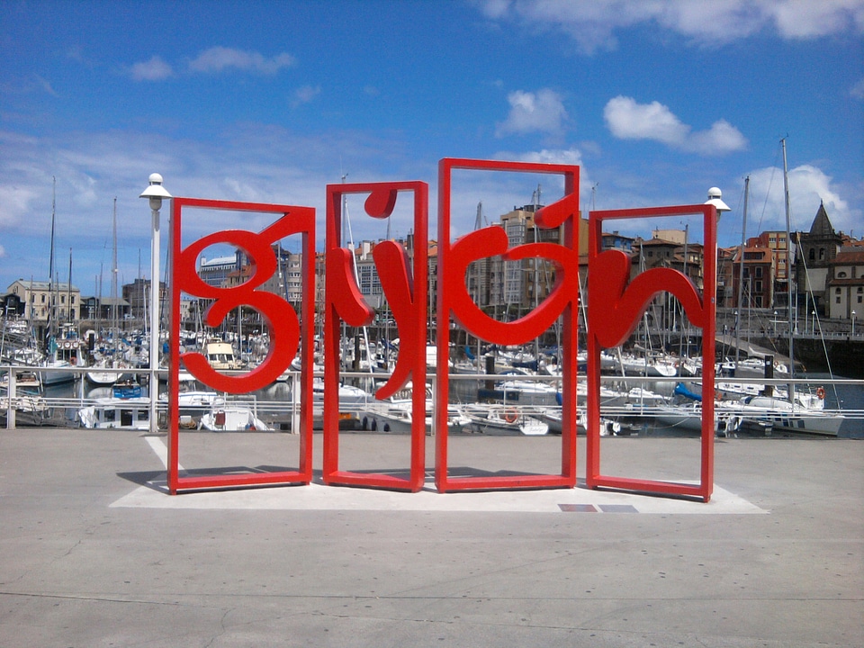 Modern piece of art with the city name in Gijon, Spain