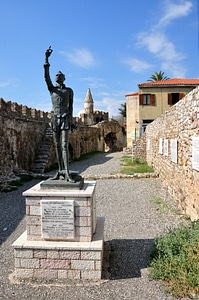 Statue of Miguel de Cervantes at the port in Nafpaktos, Greece