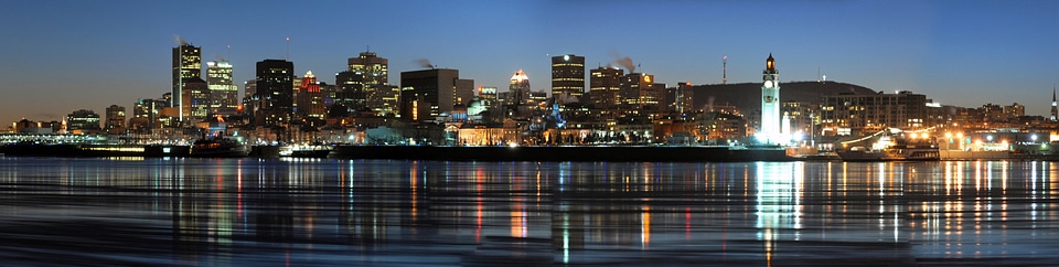 Night Time Skyline with towers and buildings over the water in Montreal, Quebec photo