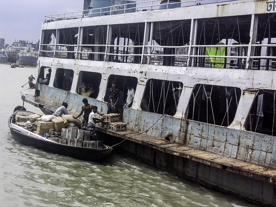Loading  the riverboat at Dhaka, Bangladesh