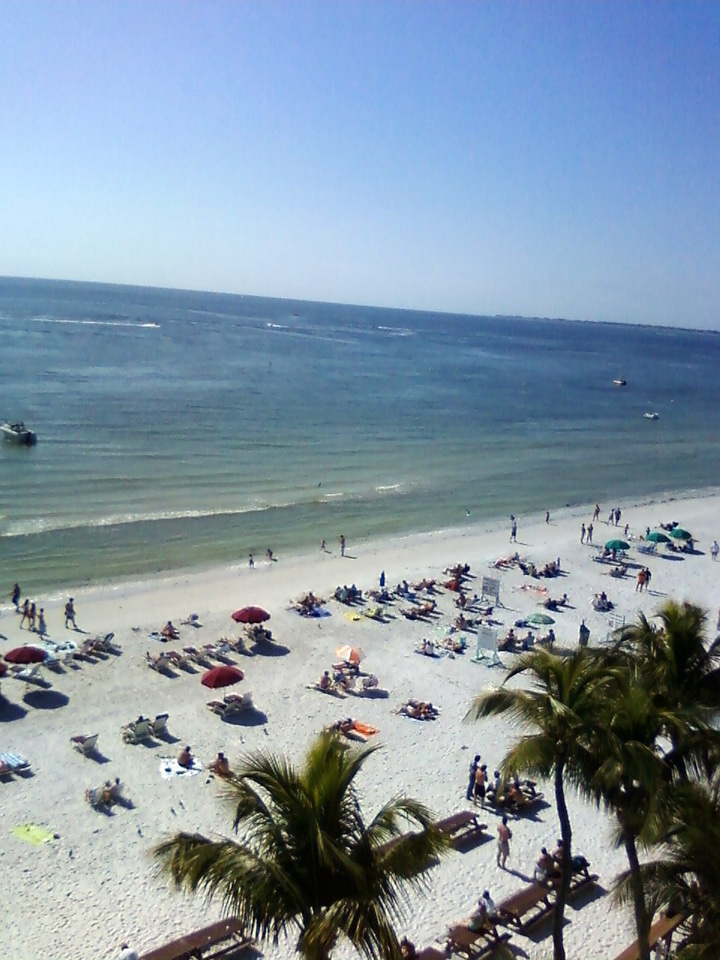 People and landscape on the coastline in Fort Myers Beach, Florida