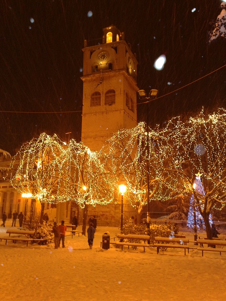 The clock tower during Christmas with Lights in Kozani, Greece