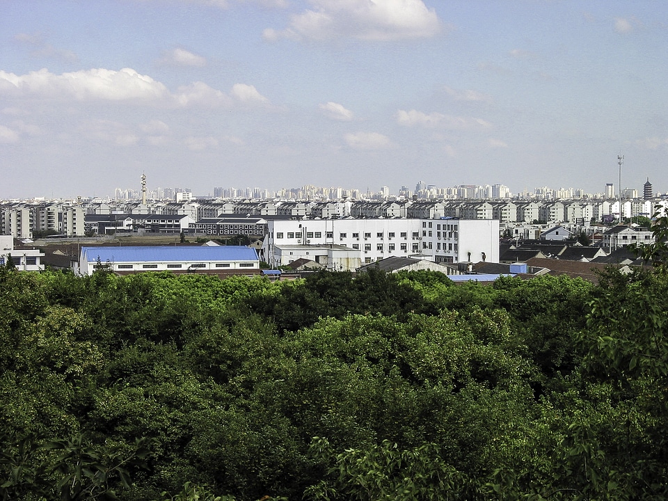Skyline of Suzhou from a park, China