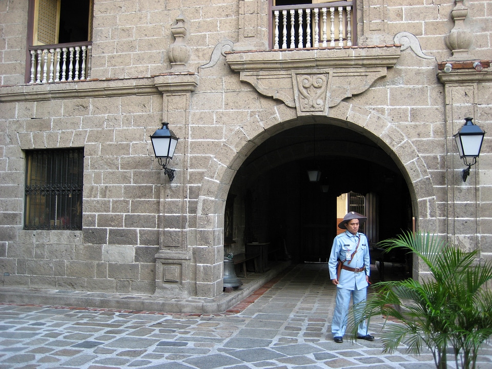 Casa Manila with guard in front in the Philippines