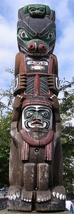 Totem pole on the Inner Harbour in Victoria, British Columbia photo