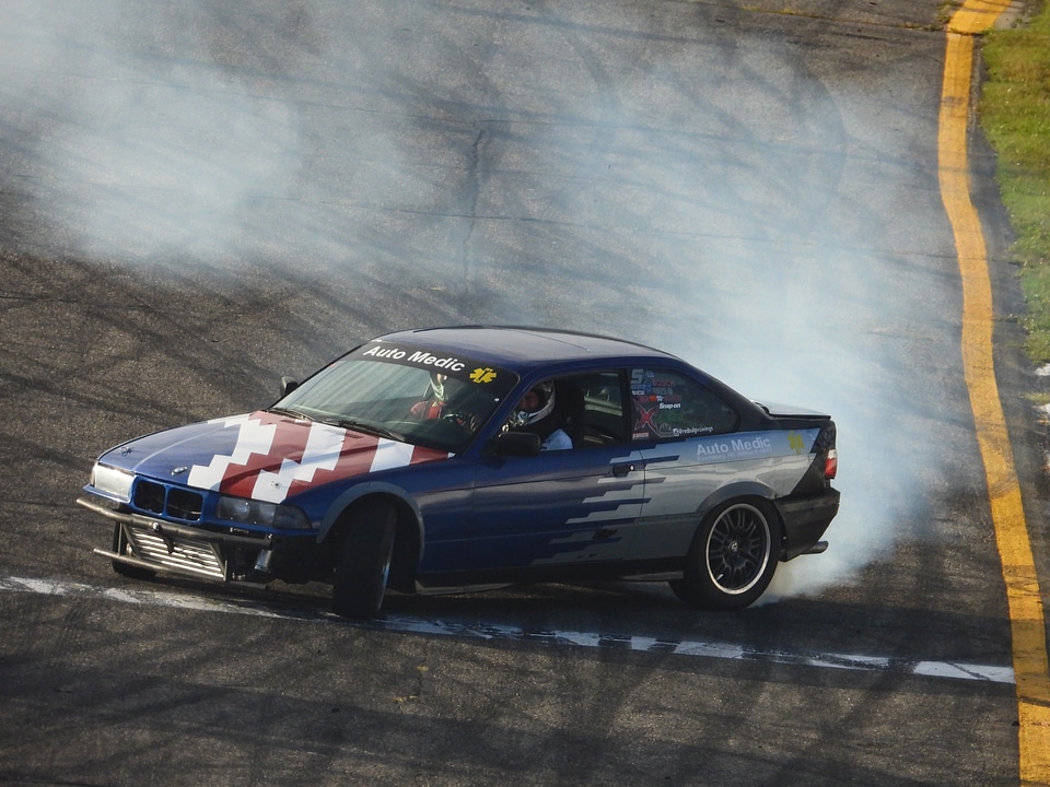 Patriotic American car drifting on the track