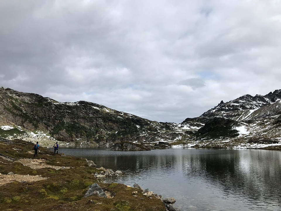 Mountains, clouds, lake, and valley