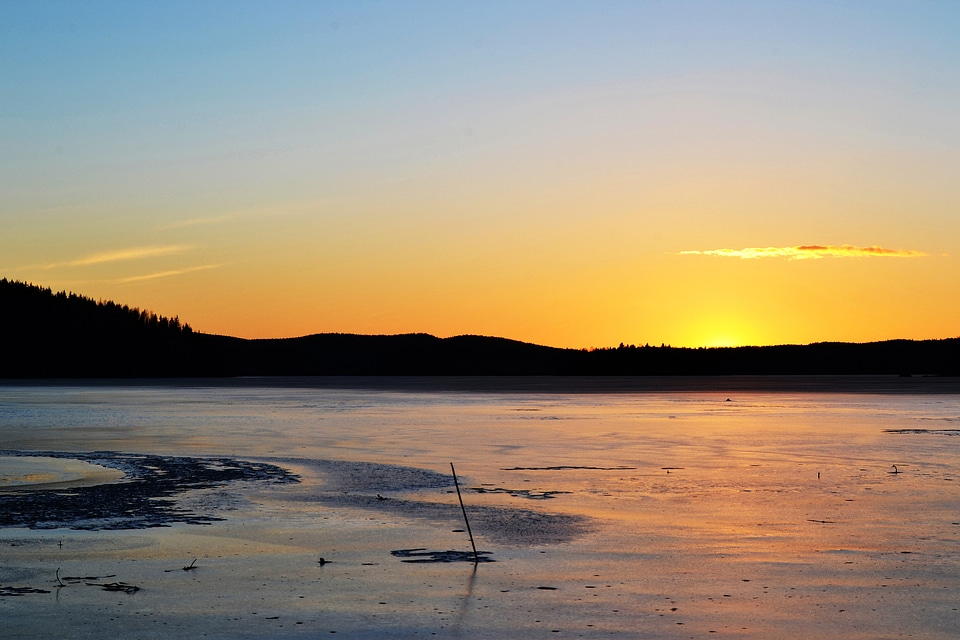 Sunset over the Frozen Lake