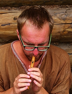 Guy playing the flute photo