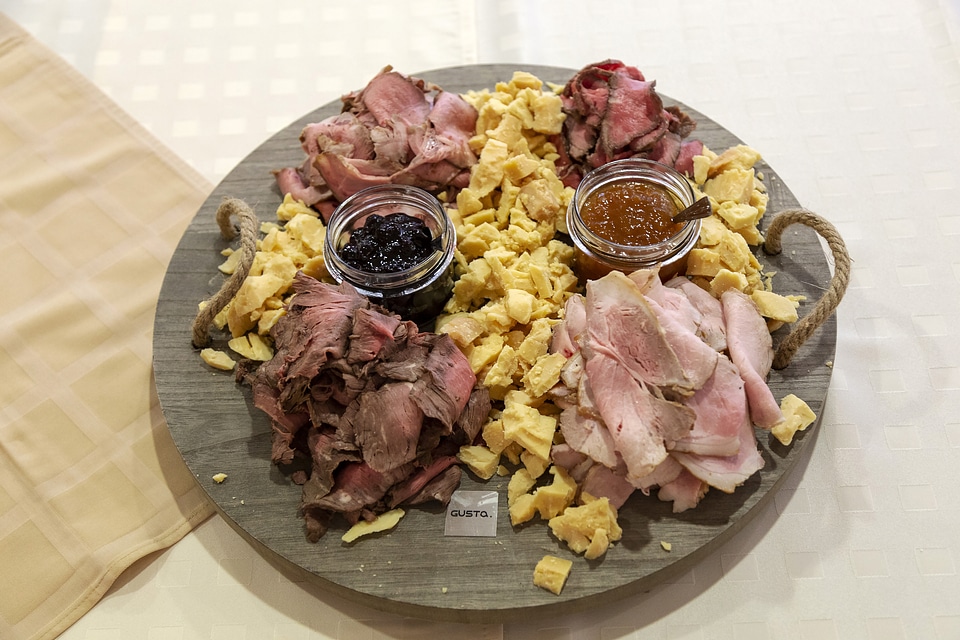 Meat, cheese, and Jam on a board