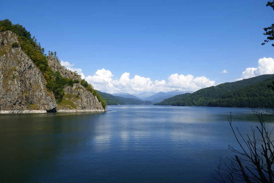 Landscape with river, water, and clouds photo