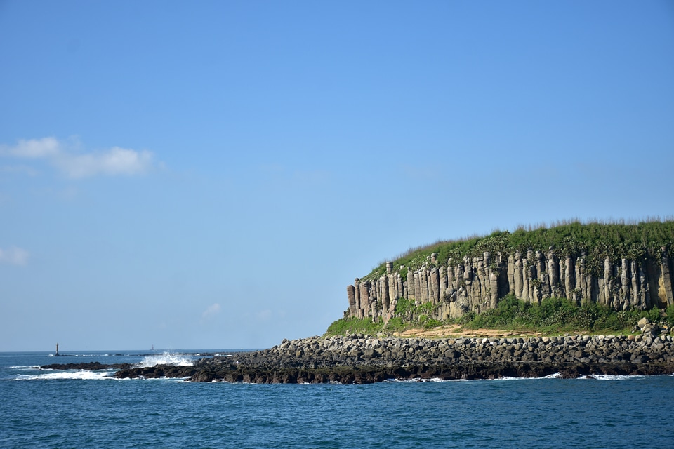 Rock structure and island landscape photo