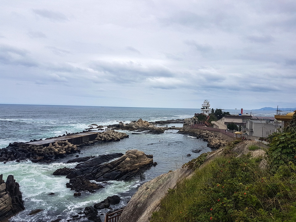 Seaside landscape with lighthouse photo