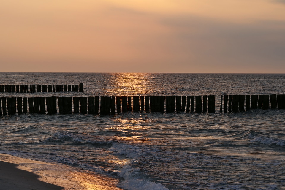 Sunset dusk on the pier and water photo