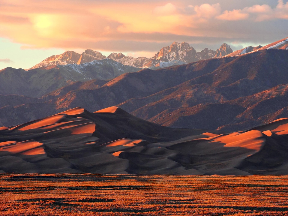 Alpenglow on Dunes and Crestone Peaks
