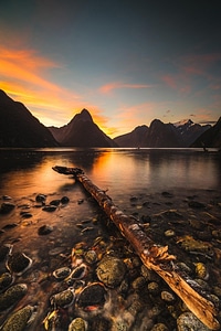 Beautiful landscape with lake and mountains at sunset