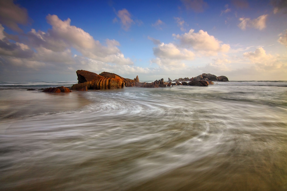 Scenic view of the seaside landscape and surf