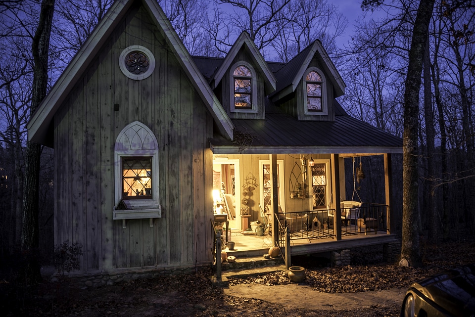 Small Cottage in the Woods with Porch light